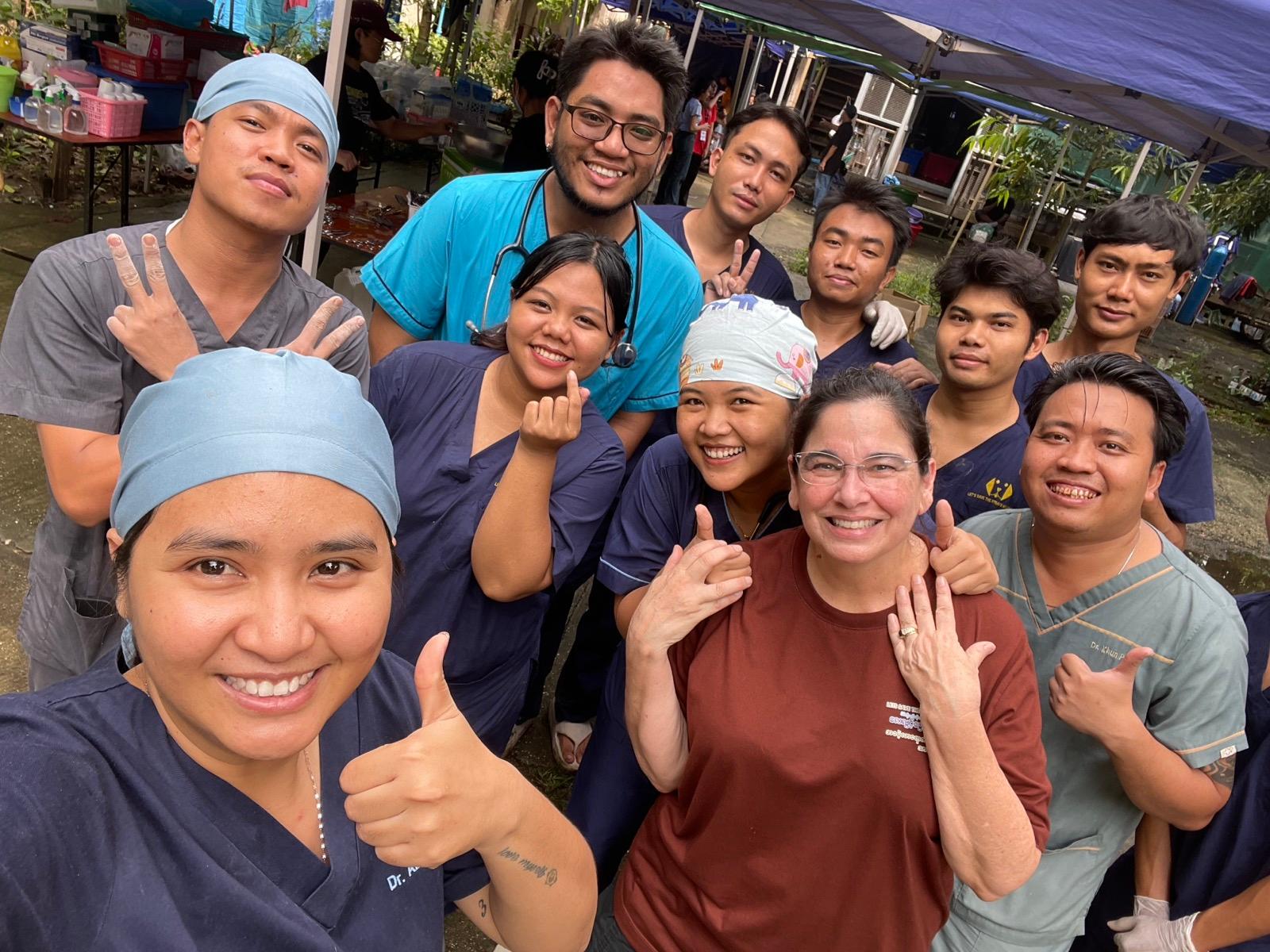 Child with a street dog in Yangon